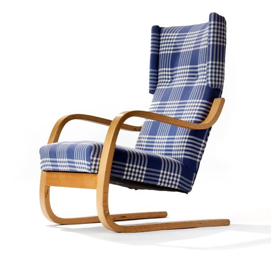 A Pair of Cantilevered Lounge Chairs
