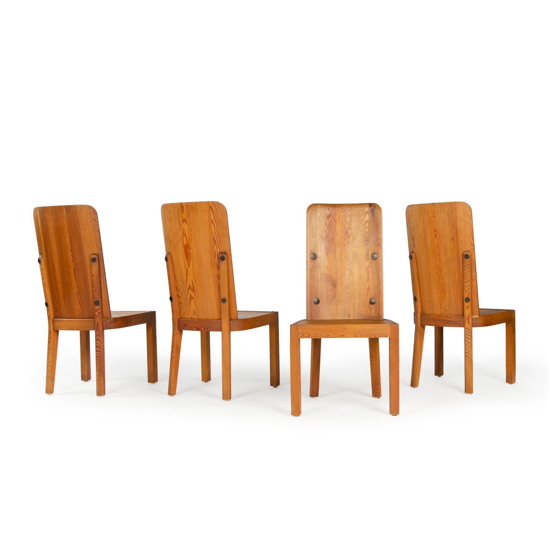 A Set of Four Pine High Back Dining Chairs