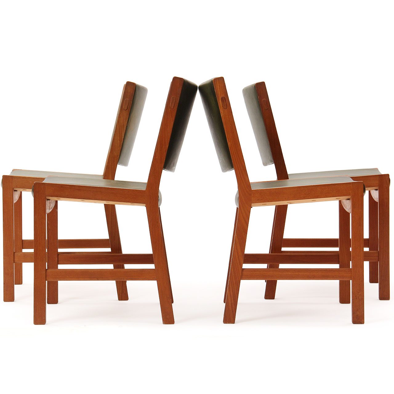 Rare Set of Four Solid Teak Side/Dining Chairs With Original Leather Upholstery.