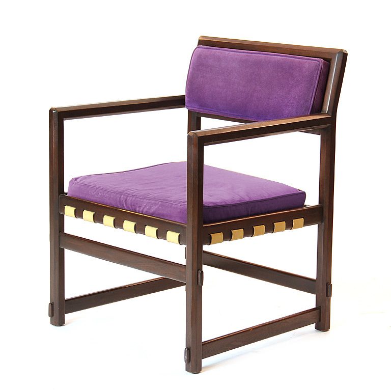 A Octaganal Frame Lounge Chair with Arms